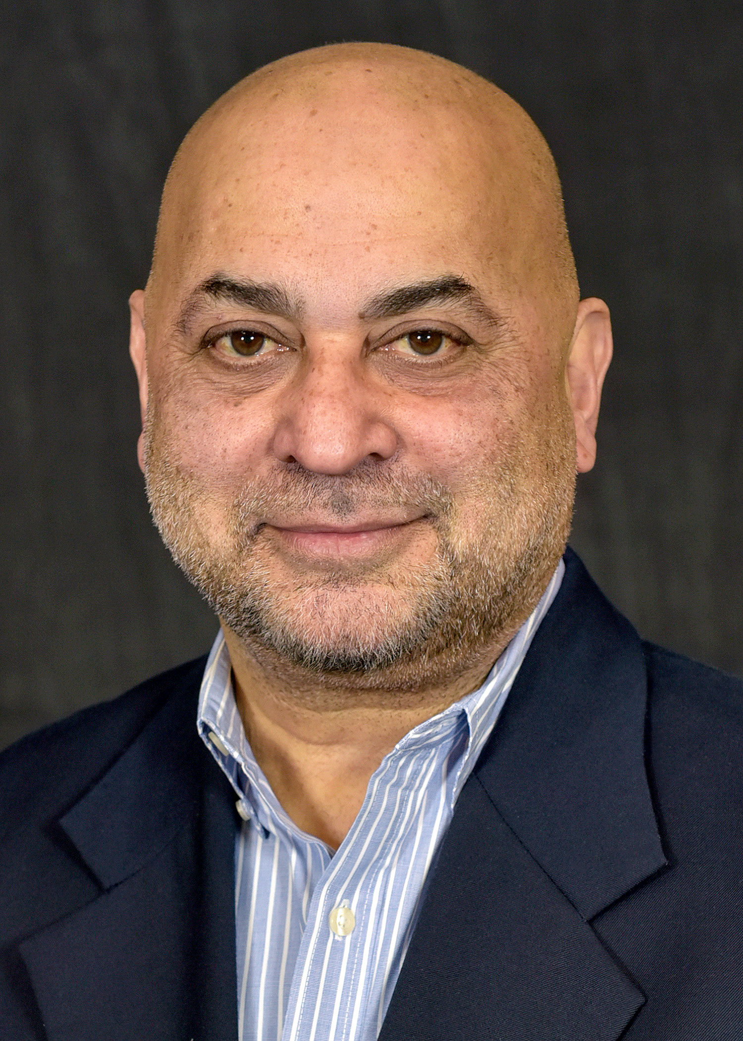 Headshot of Dr. Mohinder Dugal
