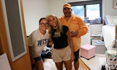 Parents with their WCSU student daughter