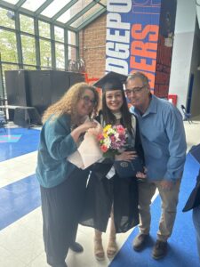 Charlotte Bishop with her parents, Jennifer Kelsey and Daniel Bishop