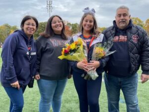 Nicole Day with her parents and younger sister