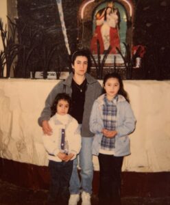 Kassandra Ruiz with her mother Luisa Ruiz, and sister Kimberly Ruiz at Nuestra Señora del Rosario de Agua Santa Church in Baños de Agua Santa, Ecuador.